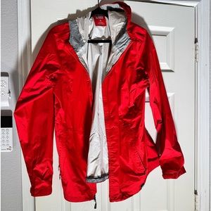 REI red women’s raincoat